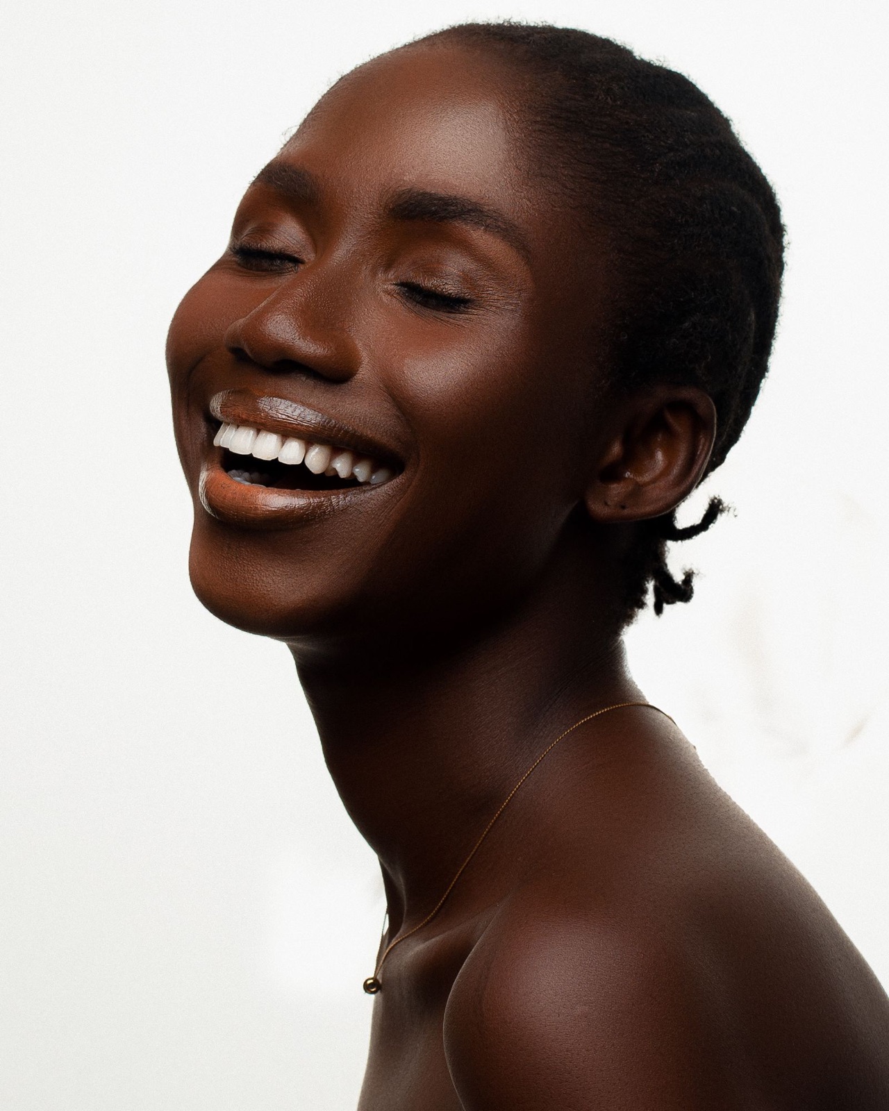 A woman with radiant, glowing skin